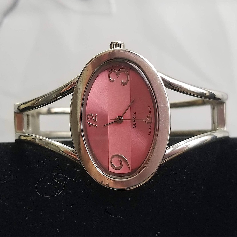 Vintage pink bangle watch. Works new battery.